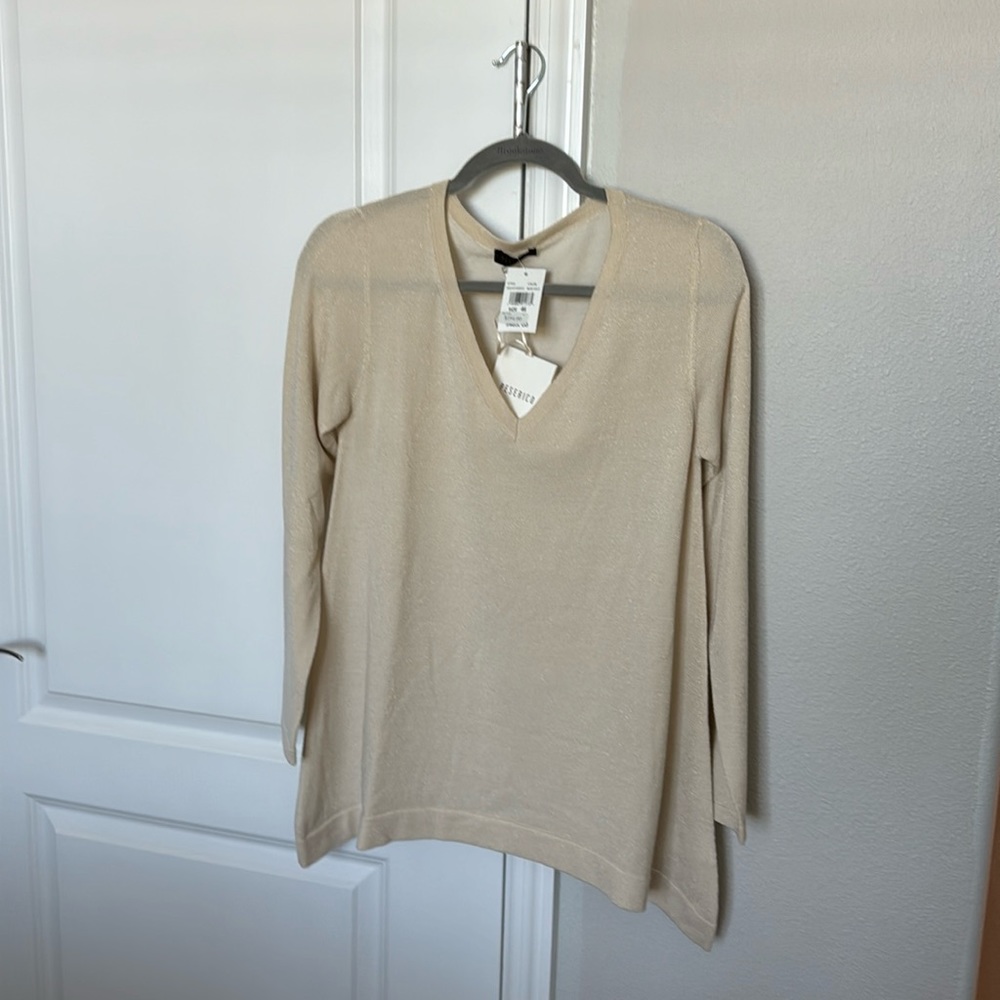Gorgeous top flares out at the bottom